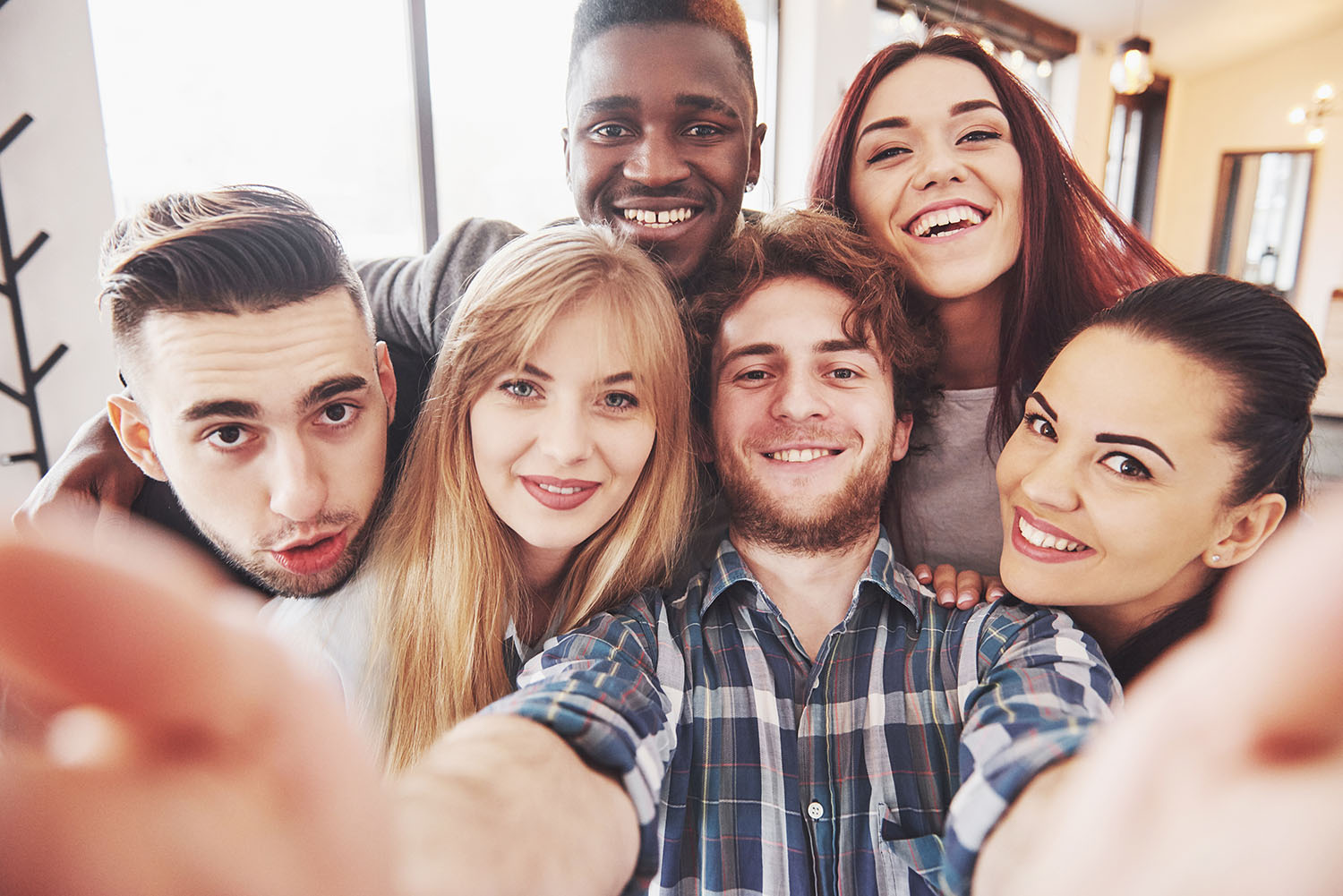 Six people taking a selfie.